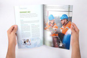 A Holding A Magazine Opened Mockup A